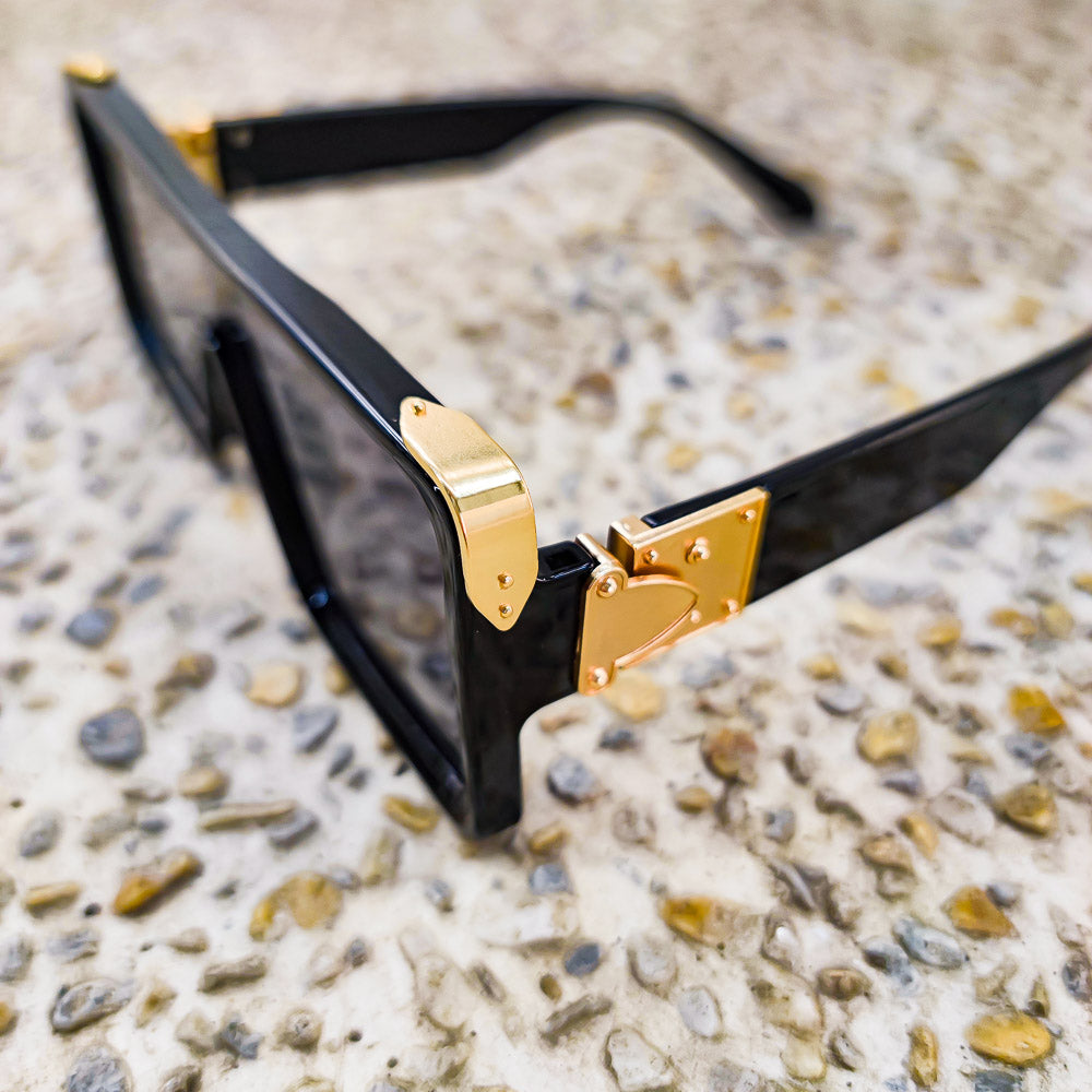 90s black and gold sunglasses